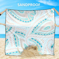 HIHOHO Beach Blanket corner pockets hold rocks for strong anchoring.
