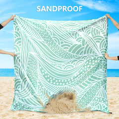 HIHOHO beach blanket folds into a compact carry bag for easy travel