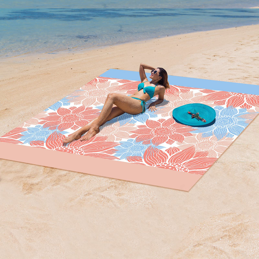 HIHOHO Beach Blanket waterproof nylon surface ideal for damp shores.