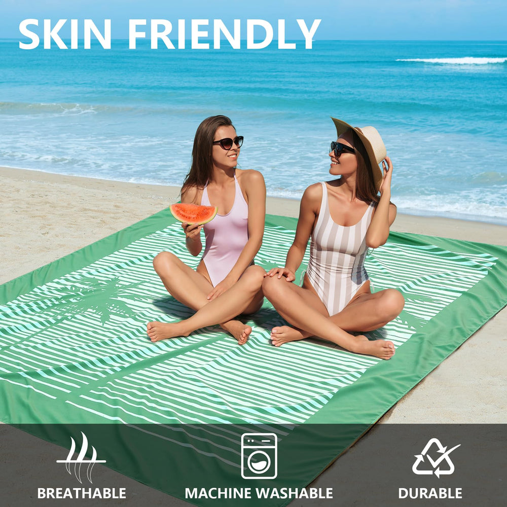 HIHOHO beach blanket waterproof and sandproof keeps sand out and gear dry.