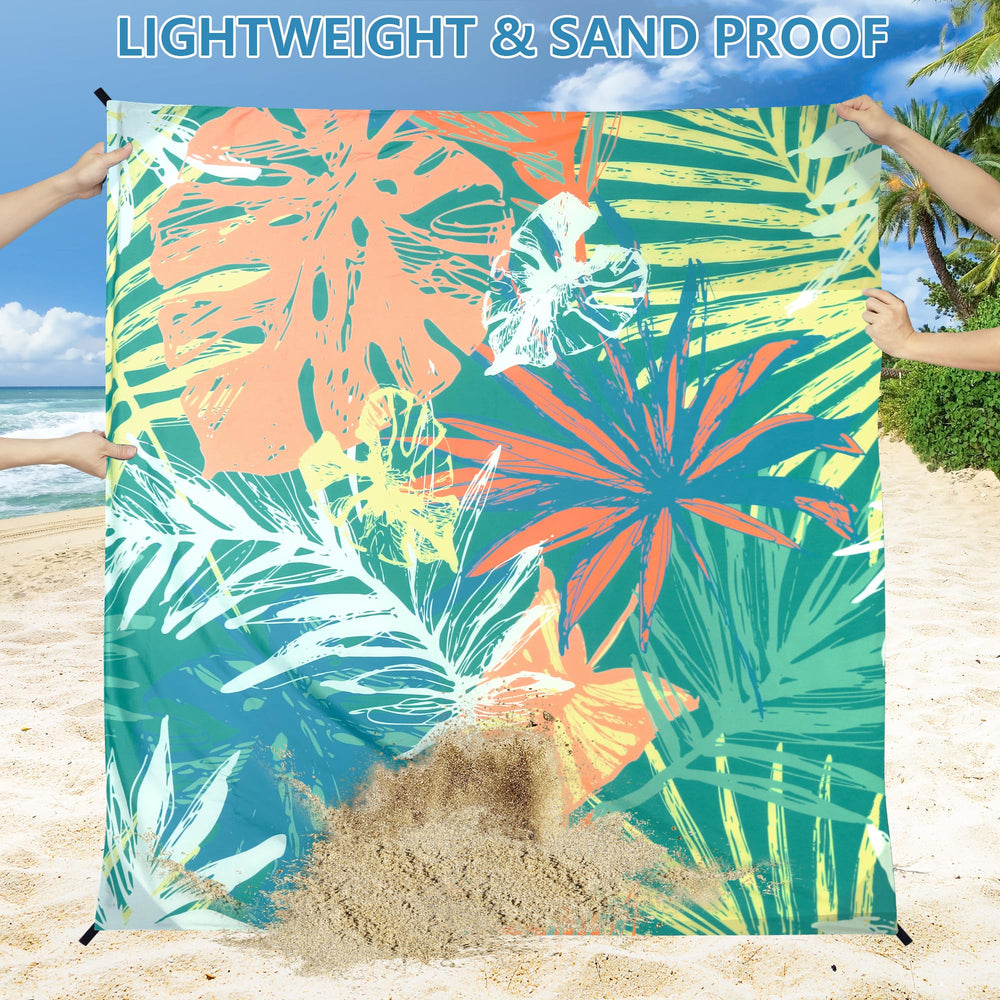 HIHOHO Beach Blanket wind-stable with corner pockets and anchors for breeze-exposed areas.