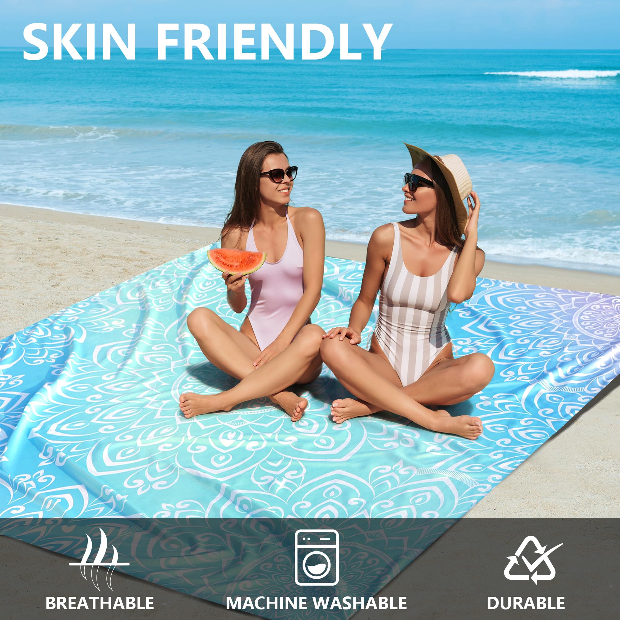 HIHOHO Beach Blanket wind-stability pockets anchored with stakes in breezy conditions.