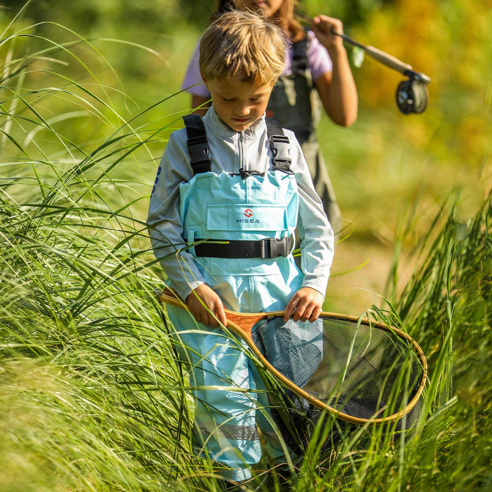 HISEA Kids Chest Waders front pocket stores small items during fishing.