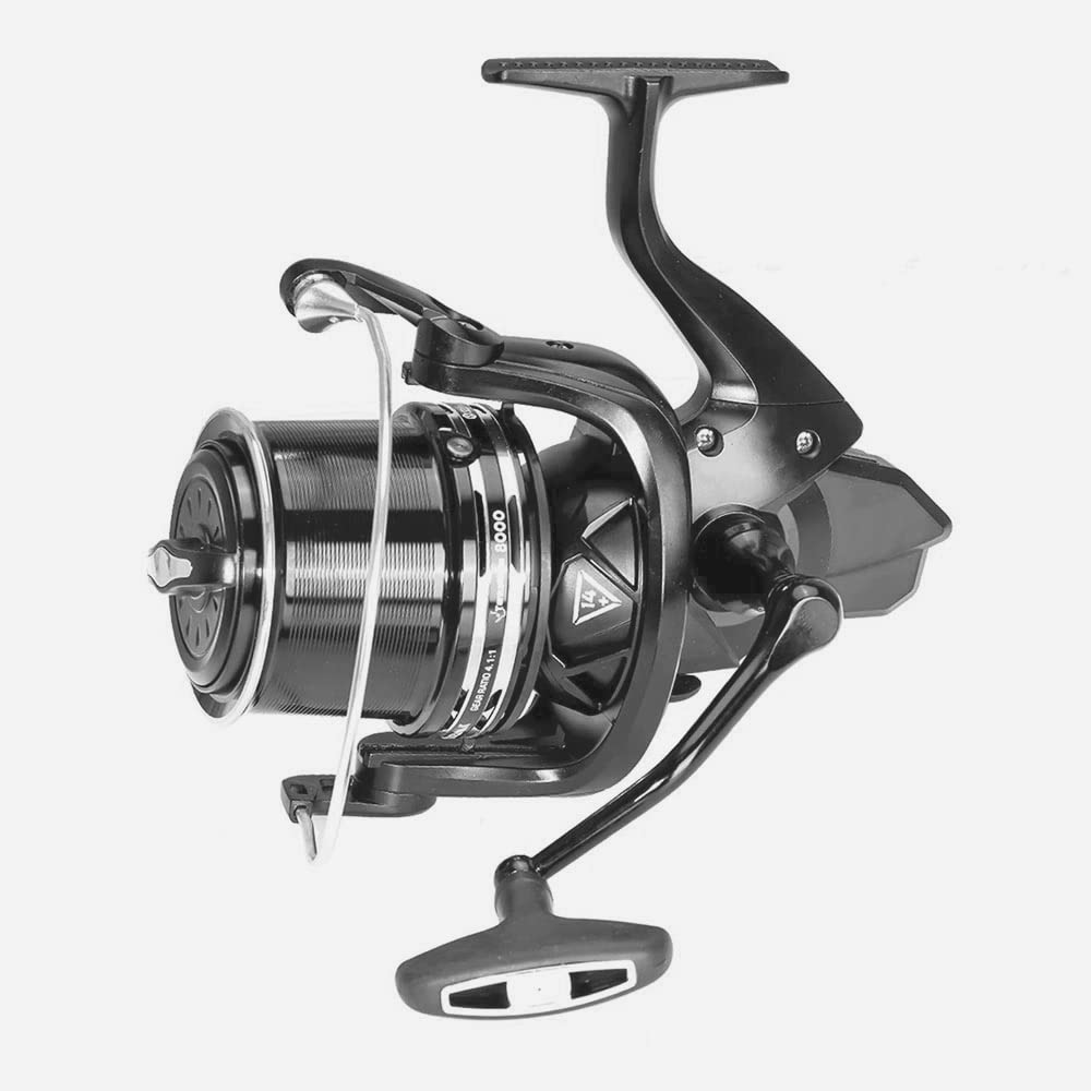 HiUmi TK12000 reel in hand for scale and portability during coastal fishing.