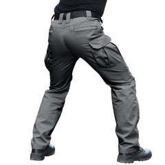 Hiwise men's stretch tactical pants show elastic waistband for secure active movement.