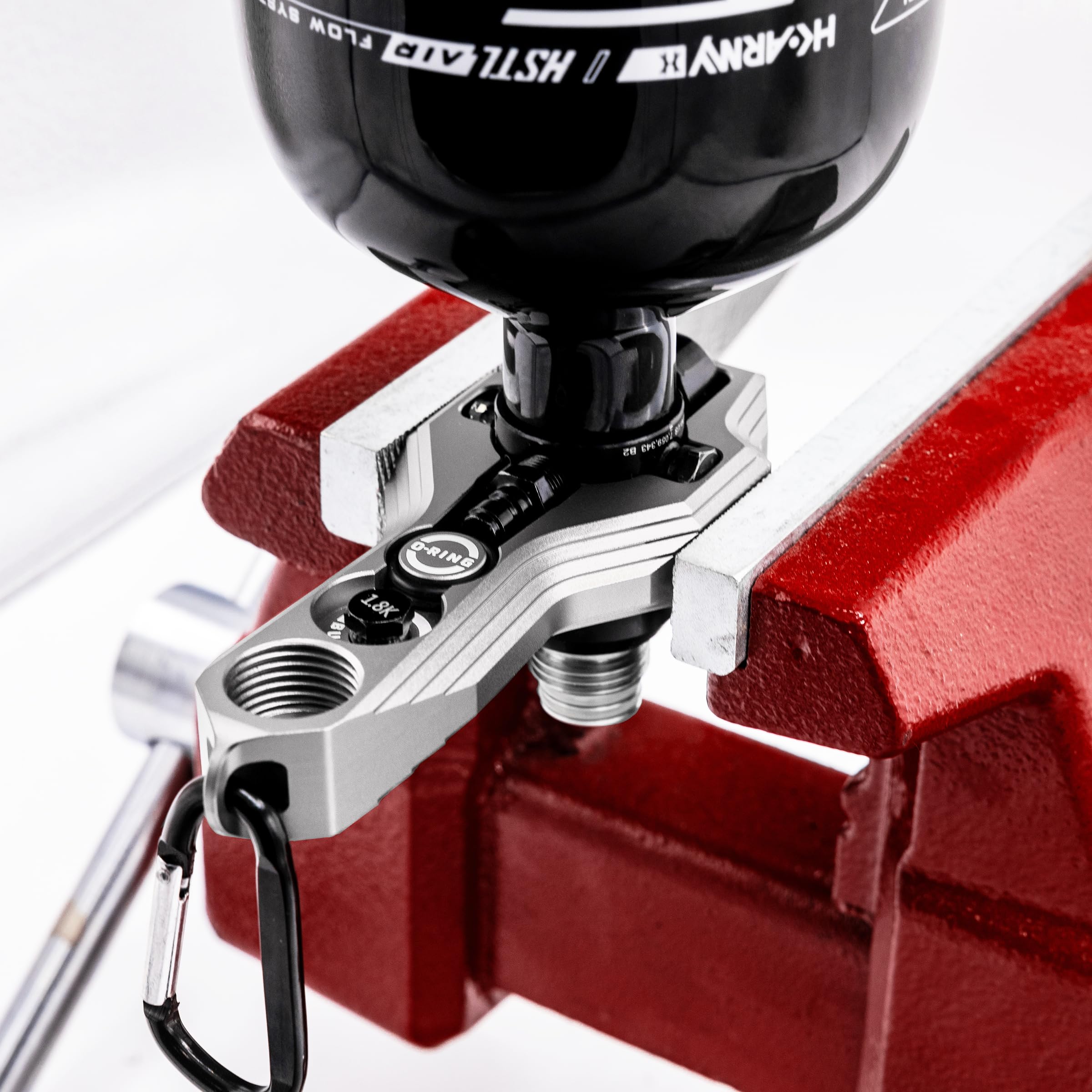 HK Army Tank Regulator Multi-Tool carabiner attachment keeps it easily accessible.