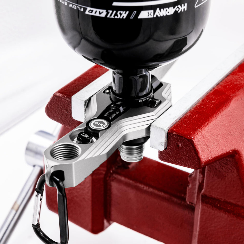 HK Army Tank Regulator Multi-Tool carabiner attachment keeps it easily accessible.