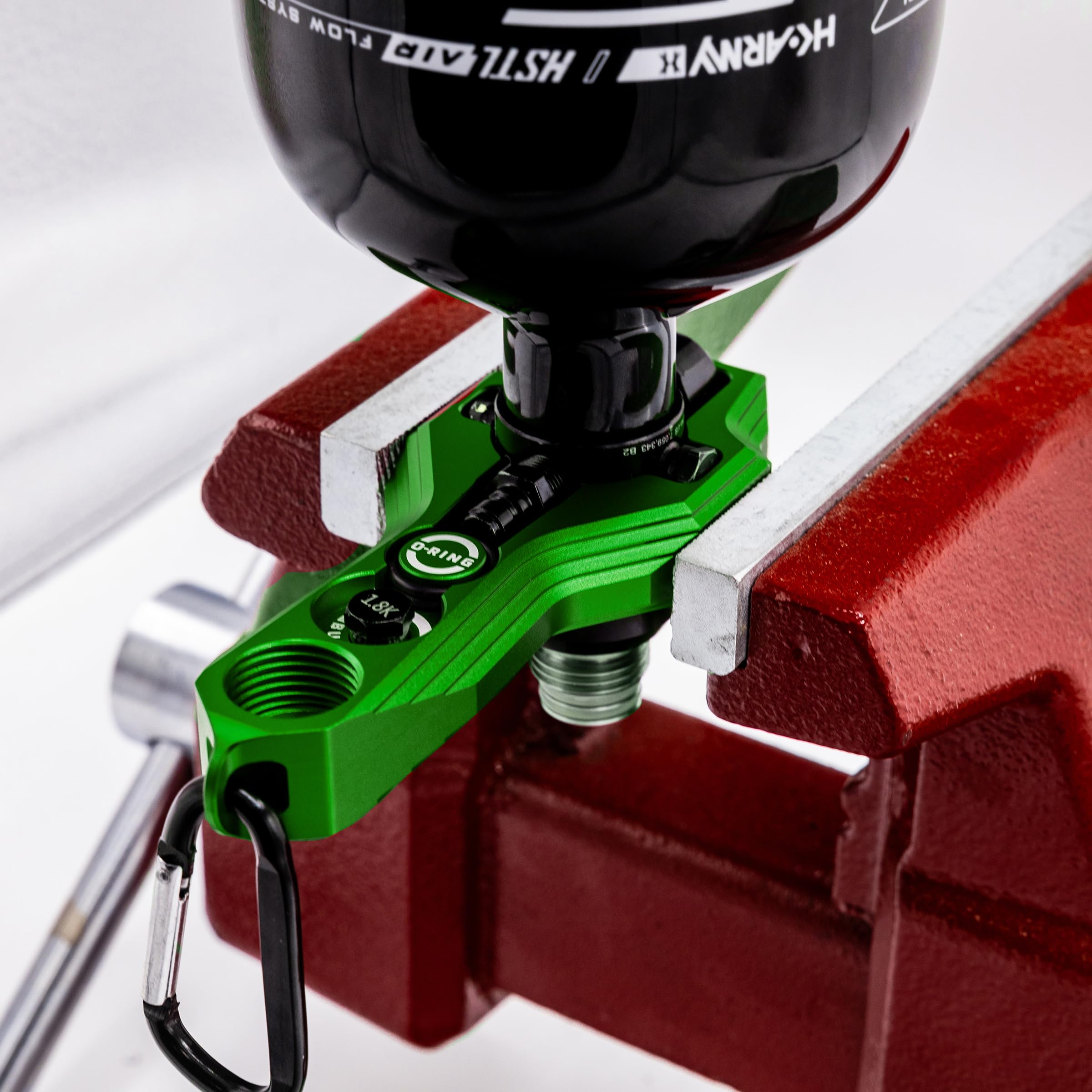 Neon green HK Army Tank Regulator Multi-Tool for quick identification in low light.
