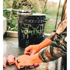 HME Game Washer sliding bucket clip keeps setup secure during cleaning.