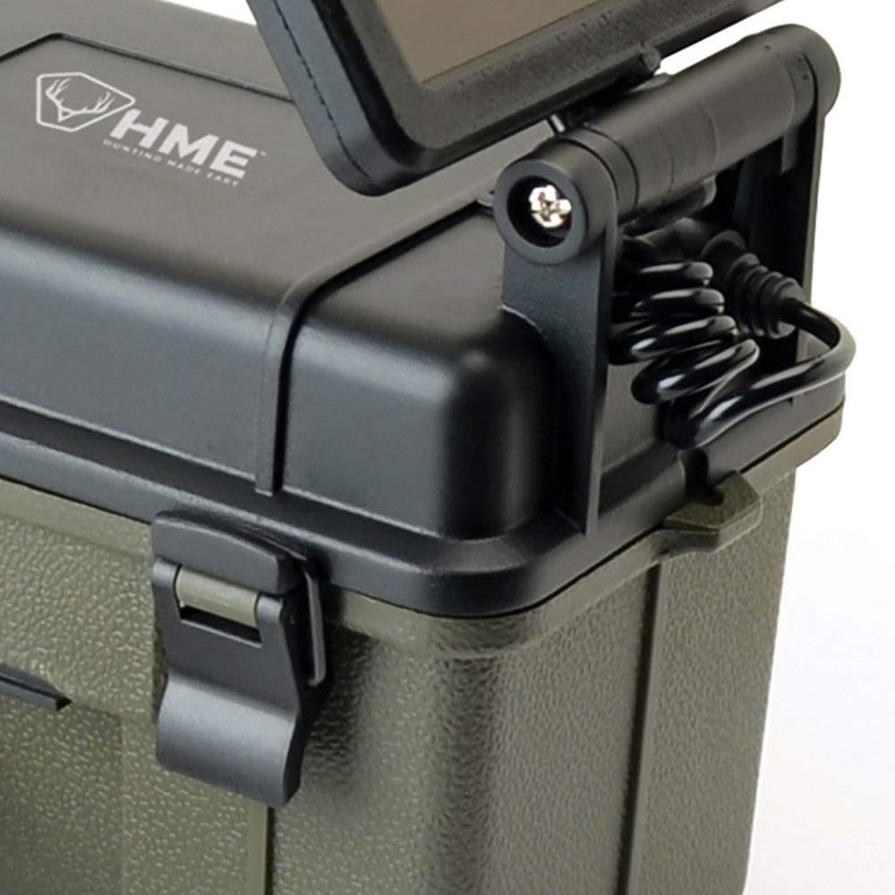 HME trail camera setup in field during dusk demonstrates extended-use capability.