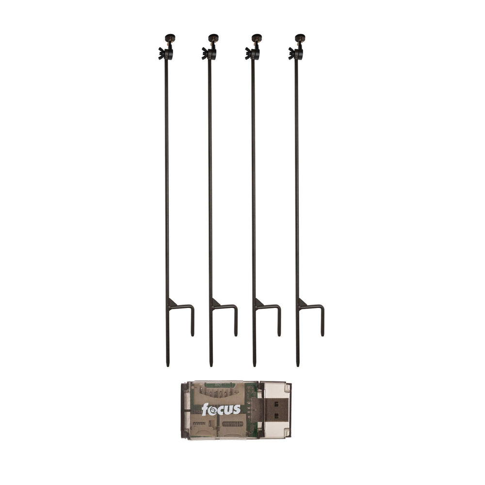 HME trail camera holder posts four-pack in wide shot showing rugged mounting setup