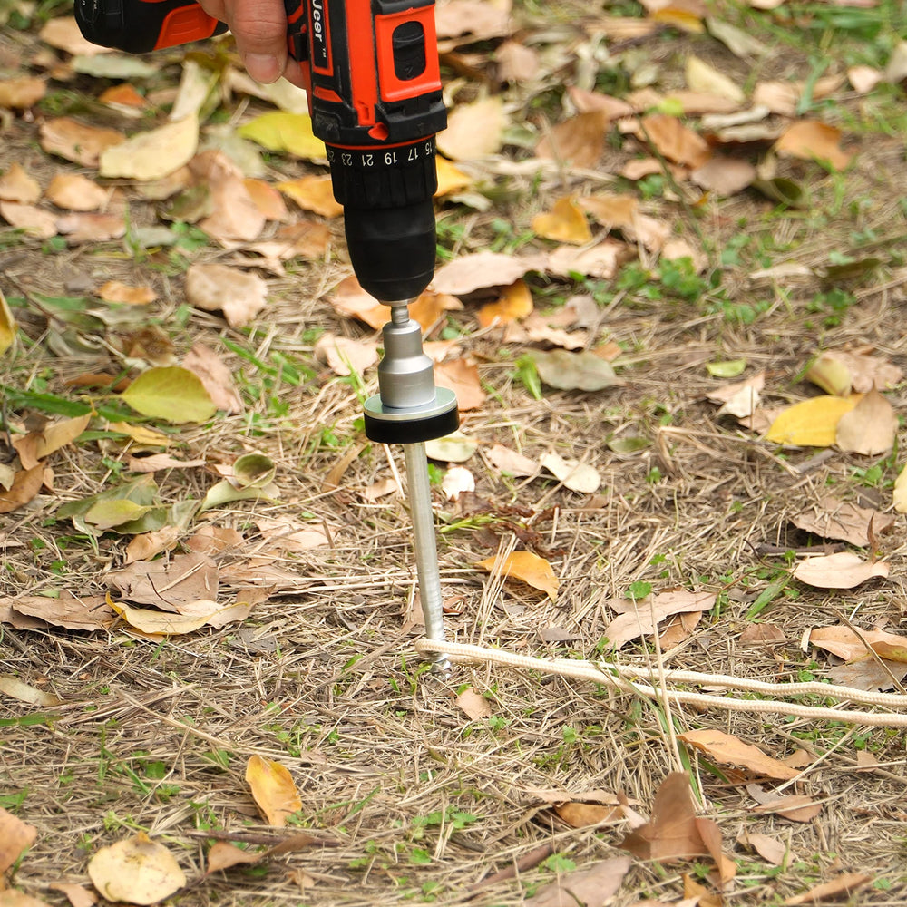 Holdia heavy-duty tent stakes in ground demonstrate wind resistance.