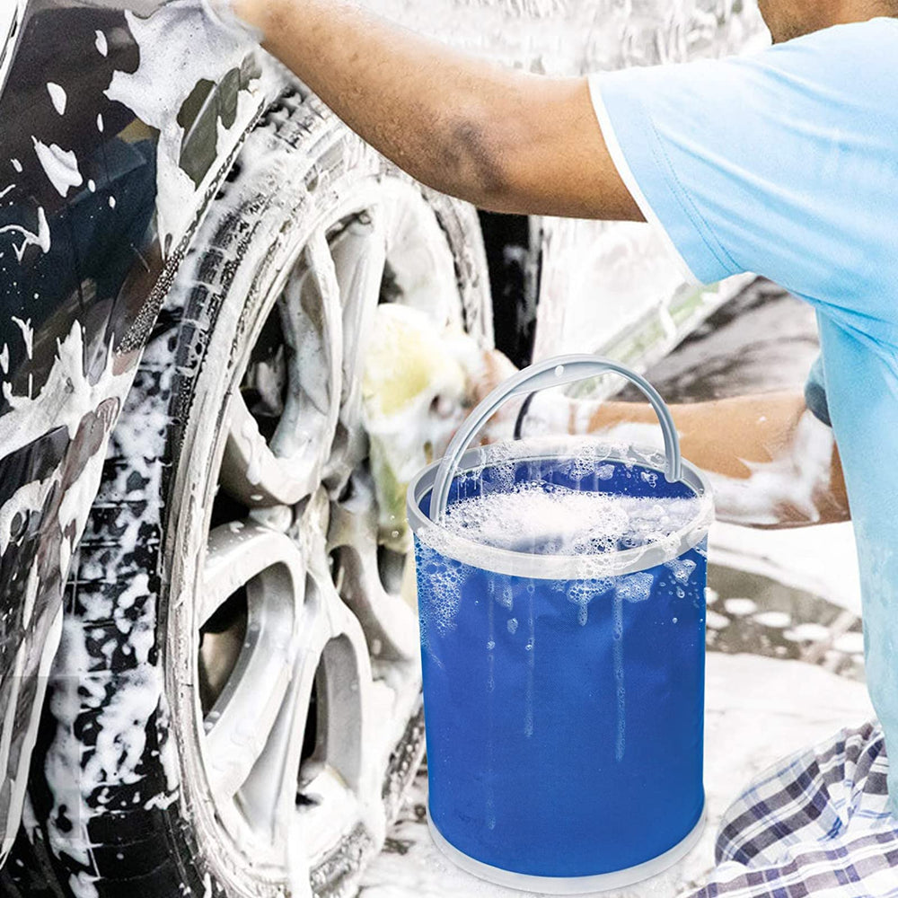 Collapsible blue bucket standing for use outdoors