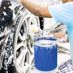 Collapsible blue bucket standing for use outdoors