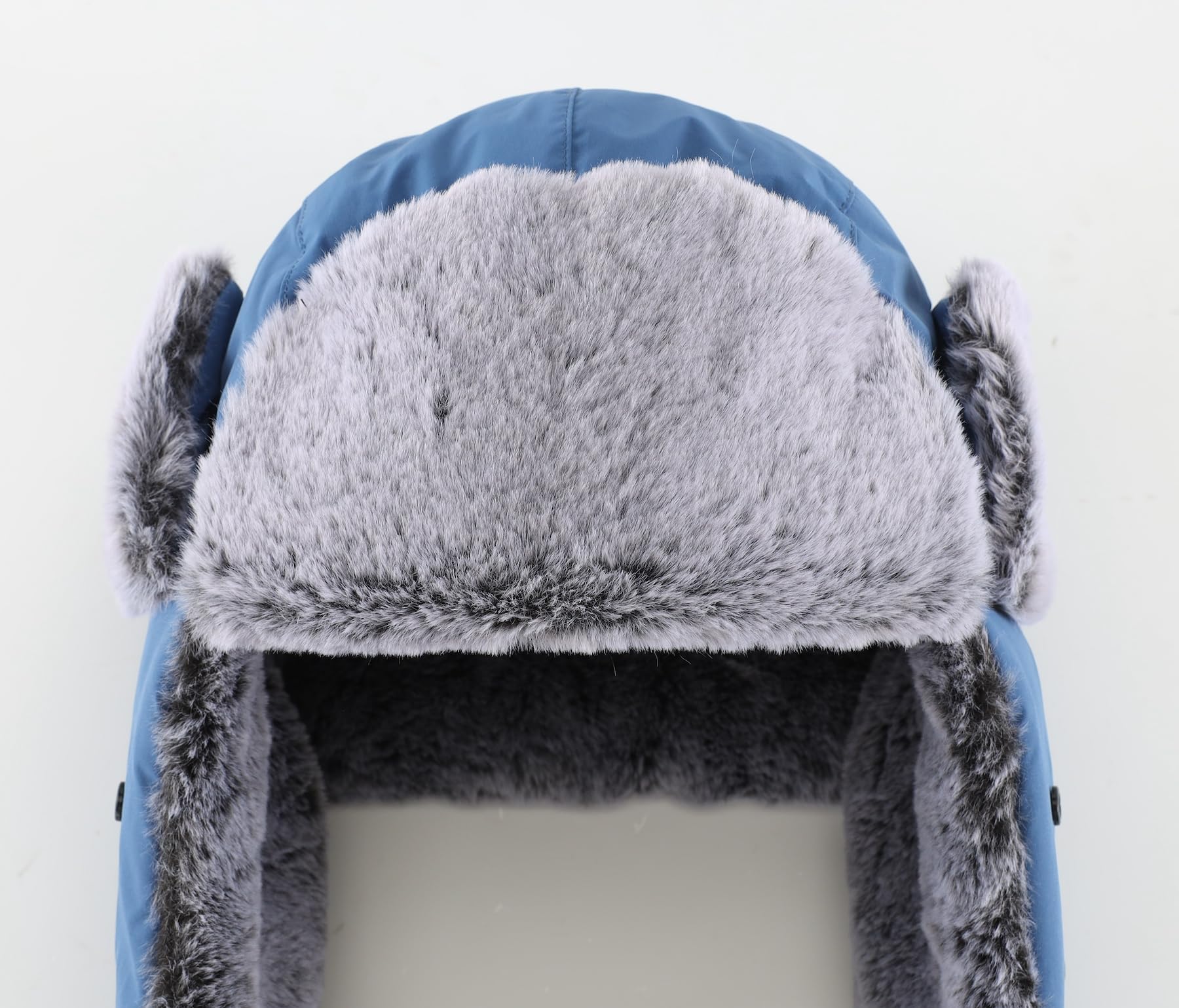 Home Prefer trapper hat adjustable strap enables a comfortable one-size fit.