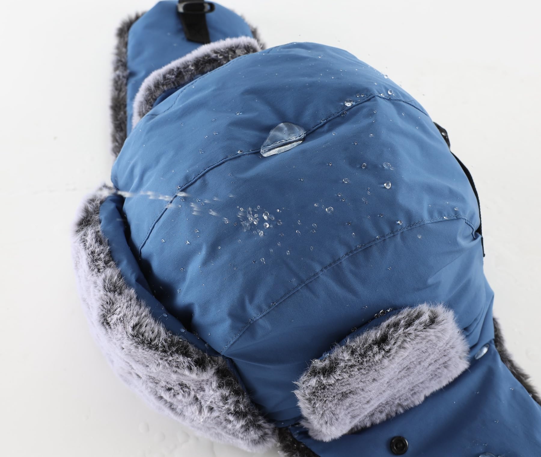 Home Prefer trapper hat water-resistant fabric keeps you dry in light rain.