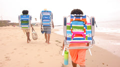 Homevative kids folding beach chair with padded backpack straps for easy transport.