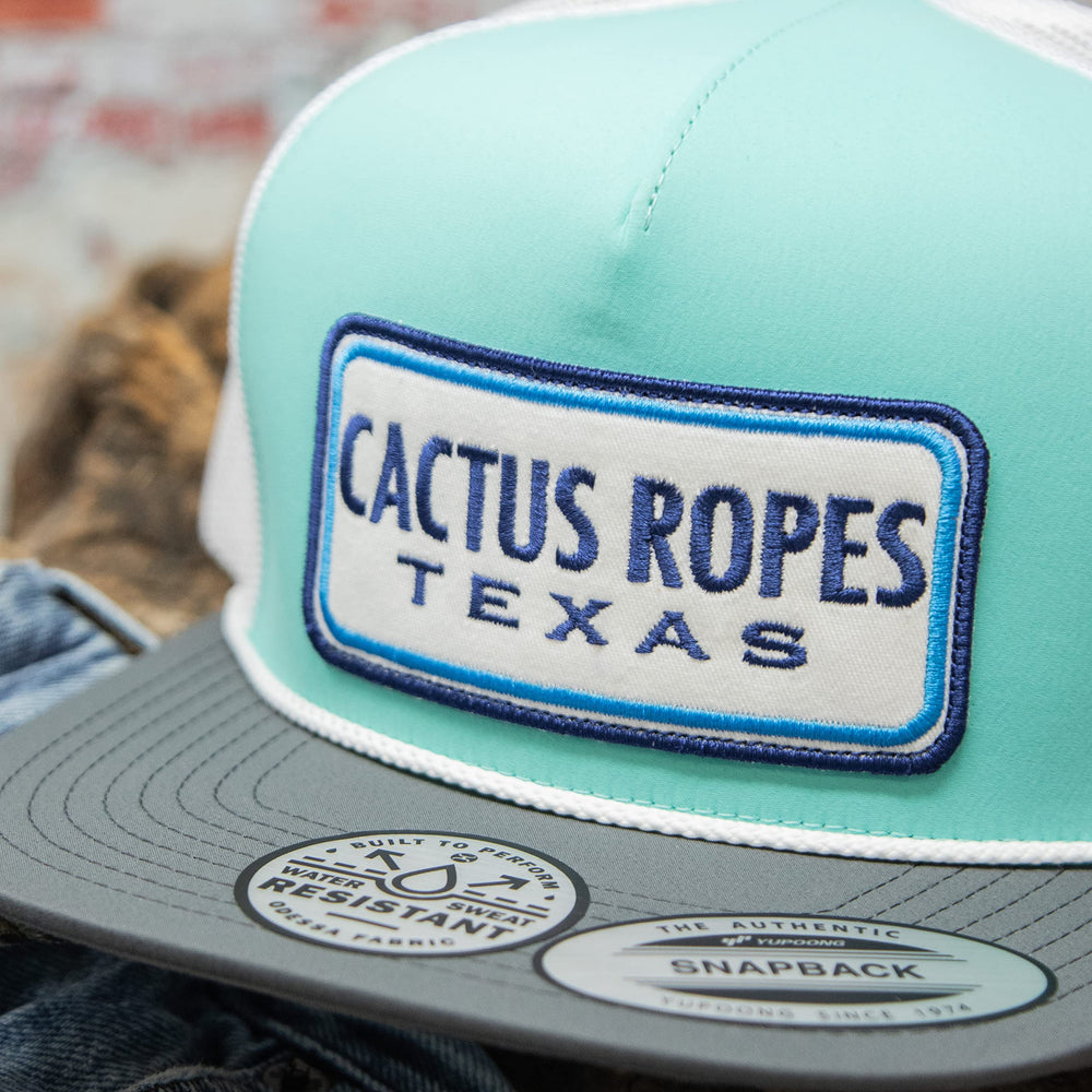 Structured crown and breathable mesh back detail on HOOEY hat