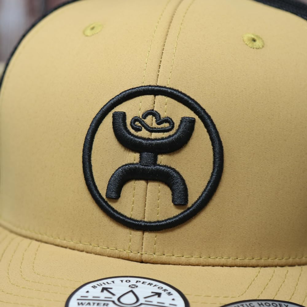 HOOEY O Classic trucker hat lifestyle view with outdoor gear pairing.