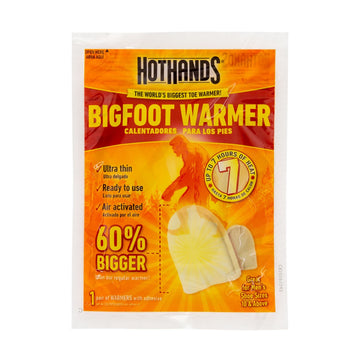 Close-up of the adhesive toe warmer activating heat after air exposure.