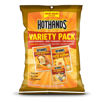 HotHands hand warmers being activated for outdoor warmth.