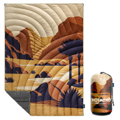hotkoko camping blanket packed in its bag for easy travel
