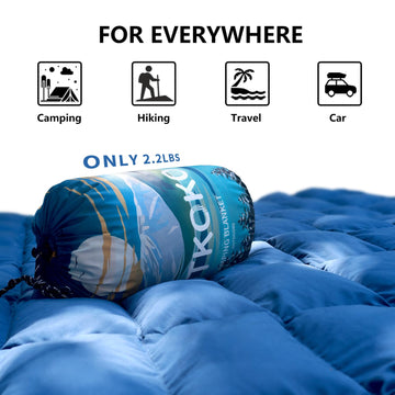 Hotkoko blanket with waterproof coating for wind and dirt defense.