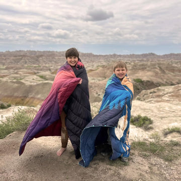hotkoko mini camping blanket multifunction use as shawl, rug, or sleeping bag.