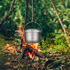 HUIOP titanium camping pot 1100ml with clear volume scale for precise cooking.