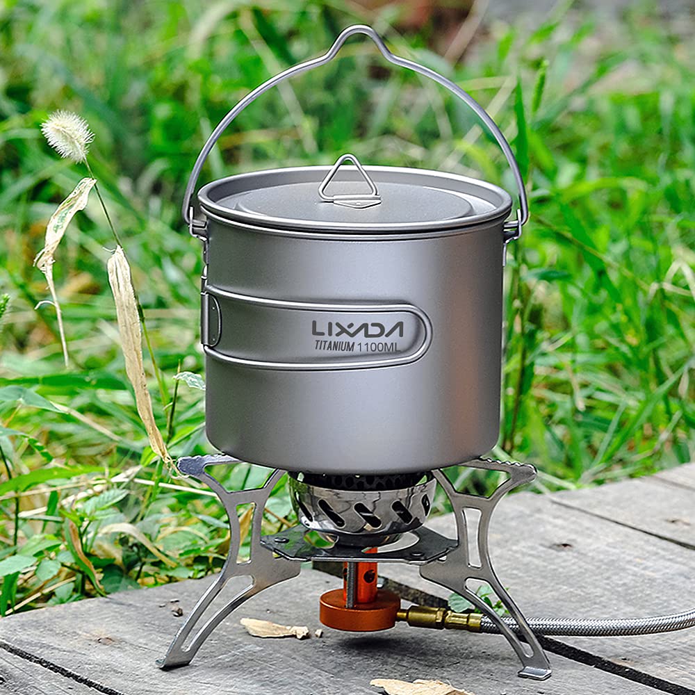 HUIOP 900ml titanium pot in a camping scene for outdoor meals.