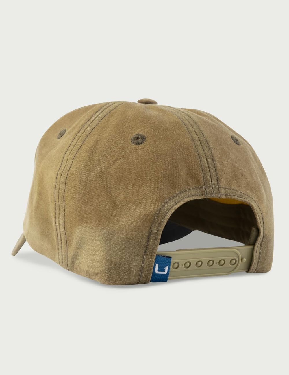 HUK men's trucker hat under visor demonstrates anti-glare protection for sunny days