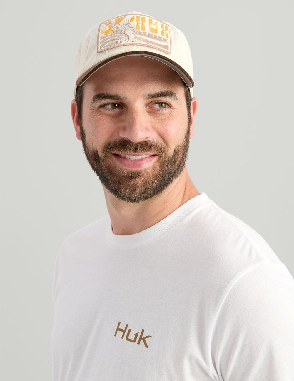 HUK Next Level Camp Short fabric detail emphasizes quick-dry performance.