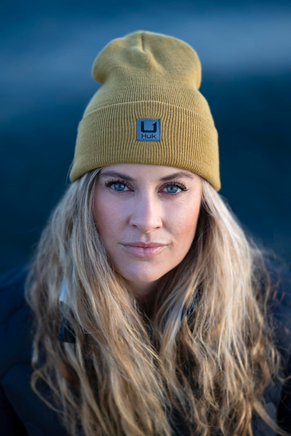 HUK Beanie warming fibers trap heat without bulk for comfort.
