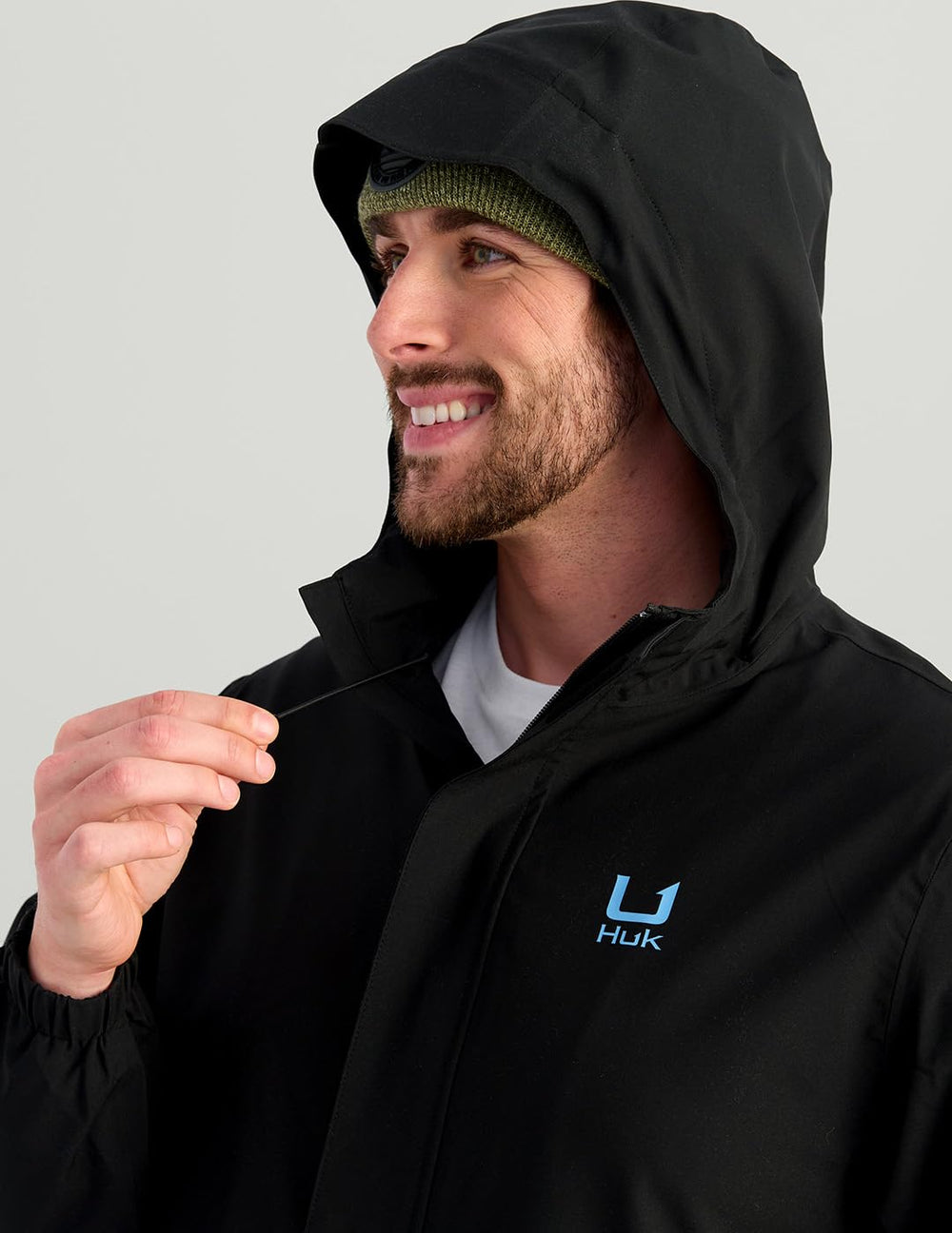 HUK Storm Rain Jacket 2.0 covered pockets protect essentials from rain.