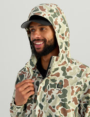 HUK Storm Rain Jacket has covered pockets to keep valuables dry