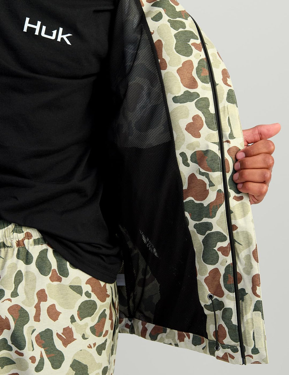 HUK Storm Rain Jacket features seam-sealed construction to block rain entry