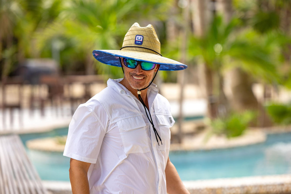 Huk straw hat features water-repellent coating to keep you dry.