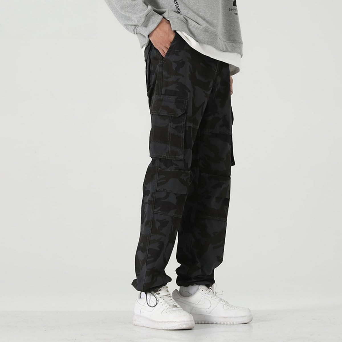 HUNGSON men's outdoor utility pants in action highlight practical durability.