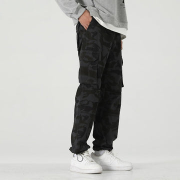 HUNGSON men's outdoor utility pants in action highlight practical durability.