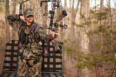 Hunter Safety System Lady Hybrid pockets closeup shows six pockets for gear.