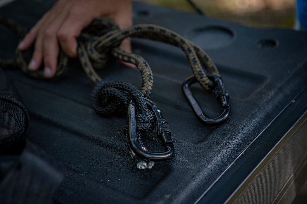 Hunter Safety System lineman rope with tree strap secures climber safely to the tree.