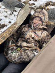 Hunter Safety System Muff Pak worn setup demonstrates hands-free accessibility and quiet hunting comfort