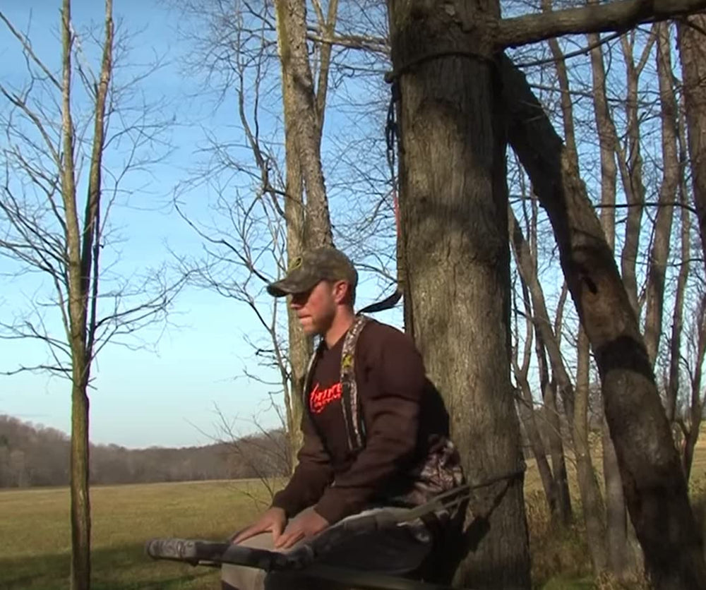 Hunter Safety System rope-style treestrap stretching 9 feet around a tree for versatile use.