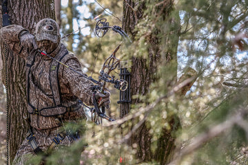Hunter Safety System Ultra-Lite Harness patented design for secure ascent.