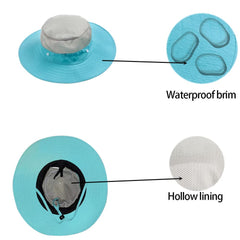 Woman wearing aqua green bug cap veil while camping