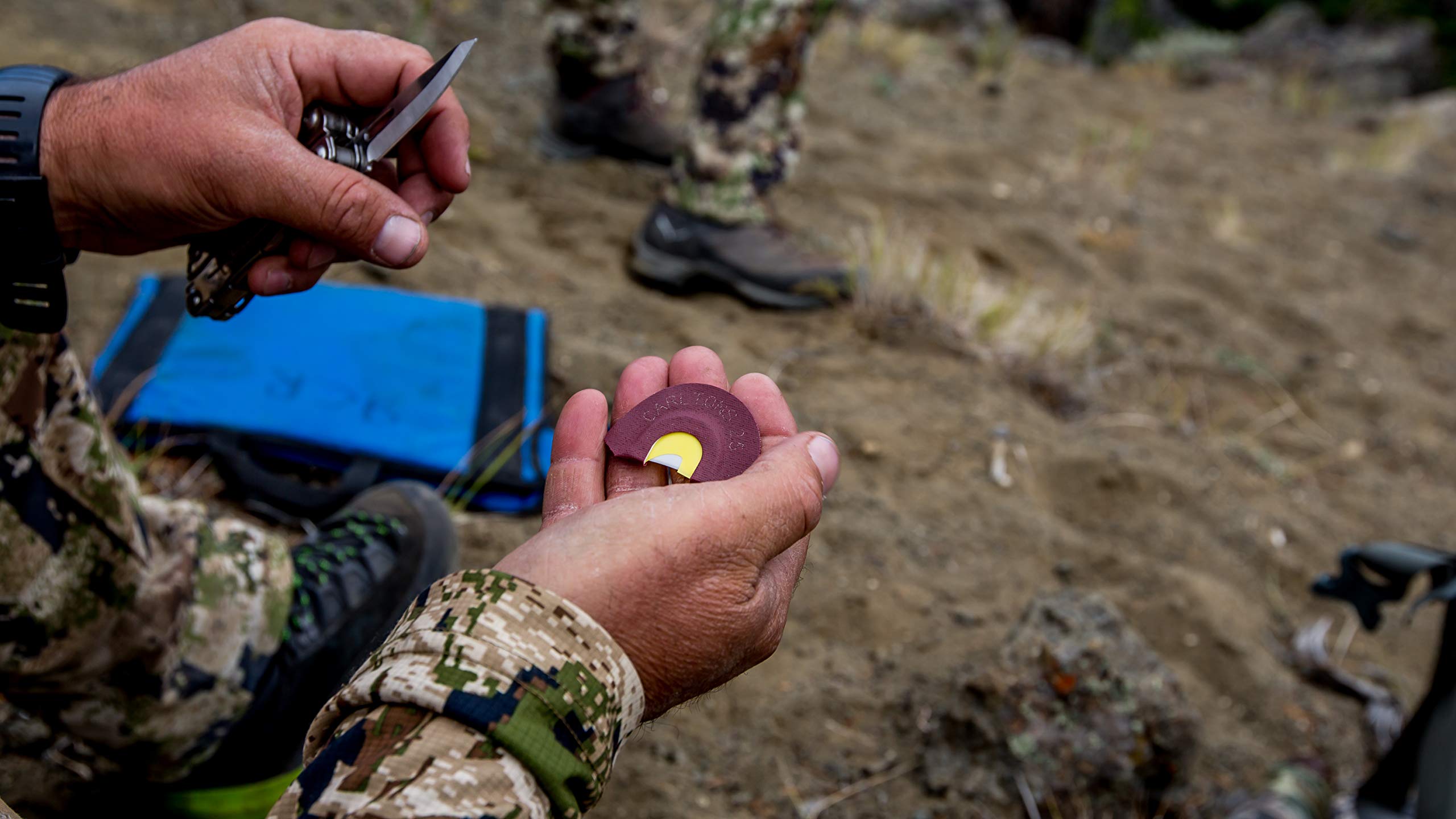 Carlton's Calls elk diaphragm call handheld view highlighting compact design for field versatility