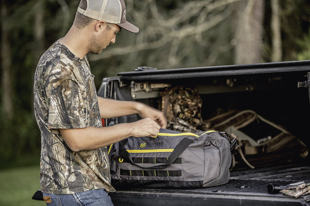 Exterior MOLLE straps for attaching extra gear and accessories on the duffel.