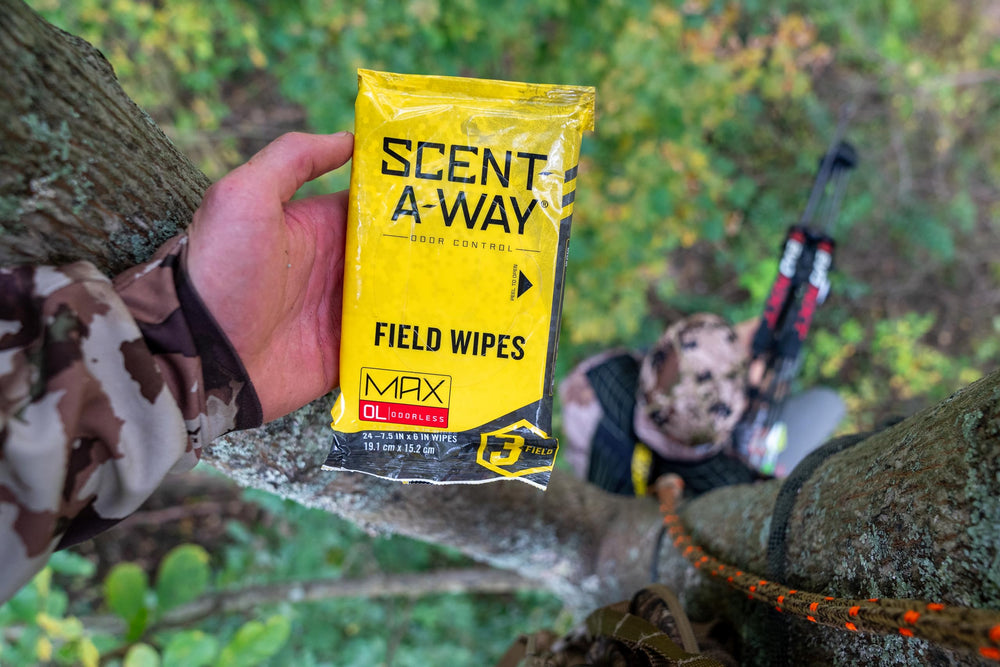 Hunters Specialties Scent-A-Way Max wipes on camp table showing odor elimination