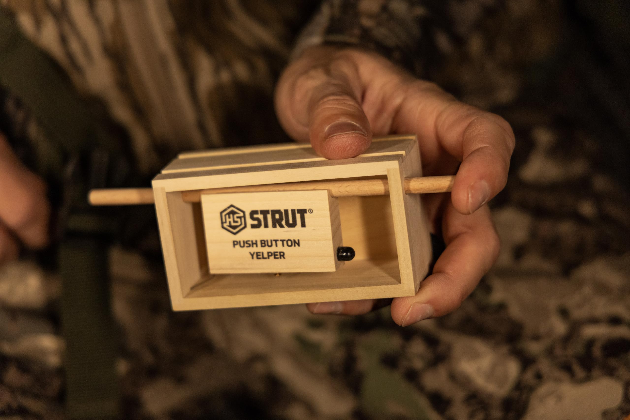 Hunters Specialties Strut Push Button Yelper compact design fits in a pocket.