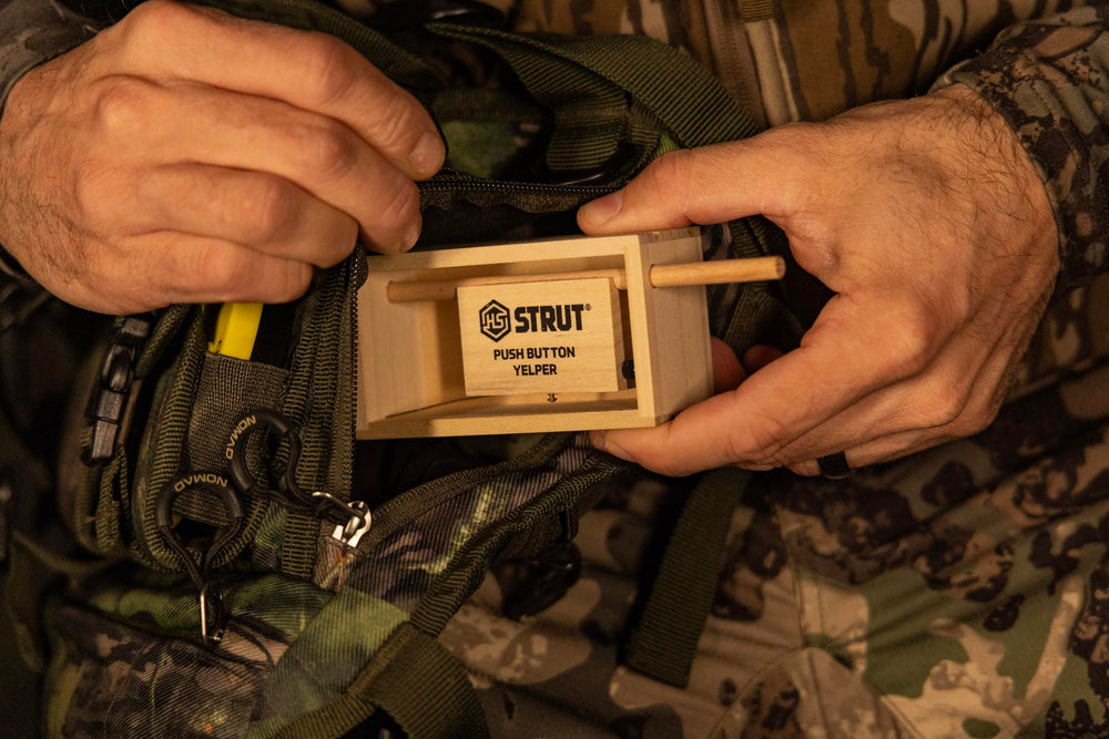 Hunters Specialties Strut Push Button Yelper in use during hunt.